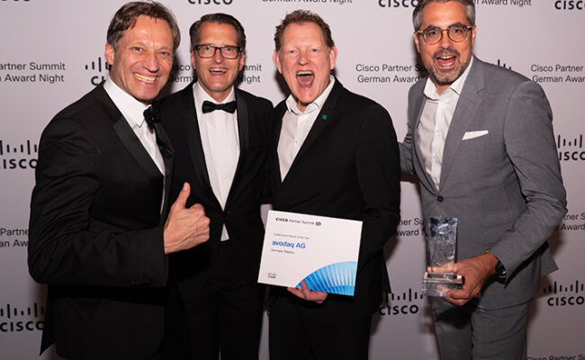 avodaq CEO Andreas Kusch and COO Marc Schmidt at the Cisco Partner Summit 2025 in San Diego with Detlev Kühne and